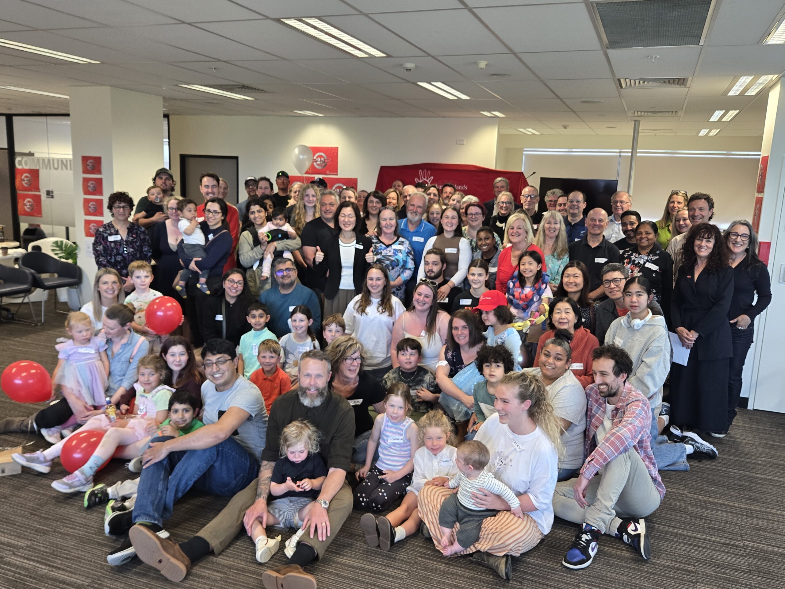 Members of Aussie Hands gathered to celebrate 25 years of community. Picture: Lesa Scholl